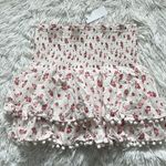 Sugar Lips Daydream Women’s Smocked Pom Pom Trim floral mini Skirt Medium Photo 3