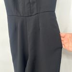 Adelyn Rae  Black Jumpsuit Flare Leg Sleeveless Pockets V Neck Back Zip Size S Photo 4