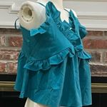 Romeo + Juliet Couture  turquoise ruffled crop top with lace up back / M … Photo 3