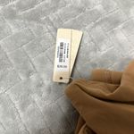 SKIMS SKINS BRALETTE SIZE XXS COLOR OCHRE
FITS EVERYBODY
BANDEAU Photo 3