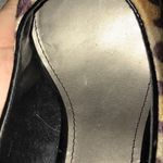Fergalicious Fergie leopard print heels in black & orange Photo 4
