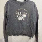 Hollister  Charcoal Crewneck Sweatshirt with Gold Accents Size M Photo 0