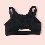 ACTA  women’s Sleek Black Sports Bra with Cutout Design Size XS Photo 2