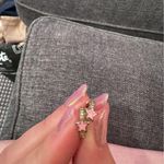 Yellow gold Huggies with rhinestones with a pink star Photo 0