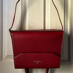 London Fog red faux leather. Adjustable strap and handles. GUC Photo 0