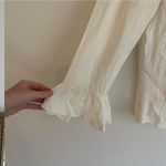 Reformation white/ cream three-quarter sleeve blouse with small keyhole detail Photo 3