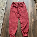 SUB_URBAN RIOT Red Sweats Photo 0