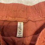 Macy's NWT Pom Pom shorts. Size Medium. Orange. Photo 3