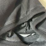 Athleta hoodie in black size medium. Rounded hem for extra length in back. Photo 3