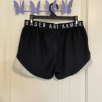Under Armour EUC |  women’s active‎ heat gear loose fit black/white shorts — med. Photo 2