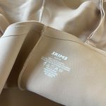 SKIMS NWT  BODY UNLINED PLUNGE THONG BODYSUIT CLAY S Photo 3