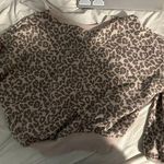 Francesca's Cheetah print crewneck Photo 1