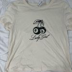 Lucky girl 8 ball shirt Tan Size L Photo 0
