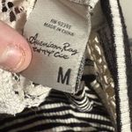 American Rag Black and White Asymmetrical Sleeveless Tank Top Photo 4