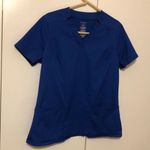 Jaanuu  Women’s Blue Nurse Hospital Scrub Top Size Medium Photo 0