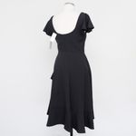 Black Halo . Tulip Hem Black Midi Dress. Photo 10