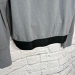 Nike  Womens Pullover Long Sleeve Shirt Size M Gray Logo Hem Dri-Fit Photo 3