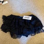 12th Tribe Black Ruffle Micro Shorts Photo 1