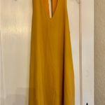 Lulus  Groove Thing golden yellow swing dress with a mock neck and front cutout Photo 2