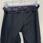 Lululemon Size 8 Black, Purple Crop Ruffle Ankle Trim Leggings with Zip Pocket Photo 4