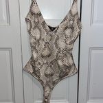 Missguided tan  bodysuit size 2 ⭐️ Photo 0