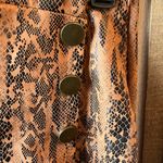 Haute Monde  Black and Orange Patterned pleather skort small Photo 2