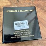 Victoria's Secret Victoria Secret gold tone necklace & bracelet set Photo 12