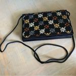 Edgy Black and Gold Skull Clutch Photo 4