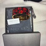 Alexander McQueen  Gold Bracelet with Red Skull Design Photo 0