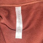 Fabletics  rust apricot color Half-Zip athletic Pullover size XLarge Photo 2