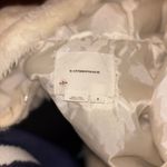 Anthropologie a white faux fur jacket by  in size S. Photo 3