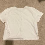 Brandy Melville “London” White Baby Tee Photo 2