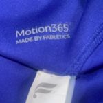 Fabletics  Trinity Motion365 Mid-Rise Leggings in Electric Violet/Powder Blue Photo 4