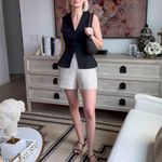 Reformation  | Oakley Peplum Collared Fitted Vest with Velvet Buttons in Black Photo 4