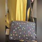 Michael Kors Authentic  leather/canvas airplane prints Crossbody Bag Photo 13
