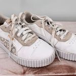 Puma  Carina 2.0 Laser Cut Flowers Sneakers White Gold Logos Athletic Feminine 7 Photo 0