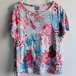 Chico's  size L tropical-themed print with florals, leaves, and a leopard motif Photo 0