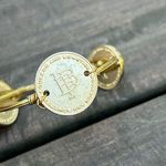 Bourbon and Bowties Gold Elephant Wire Bangle Bracelet w/ Coin Detail Photo 1