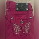 Miss Me  Skinny Jeans with Rasberry Angel Wing Bedazzled Rhinestone Back Pockets Photo 1