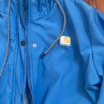 Carhartt Light Blue Lined Rain Jacket. Fits like size Large. Photo 1