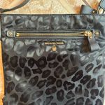 Michael Kors Black Crossbody Bag with Adjustable Strap and Glossy Finish Photo 1