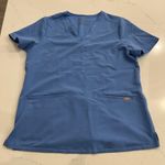 FIGS Casma Three-Pocket Scrub Top Light Blue Size Medium Photo 0