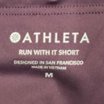 Athleta  Run With It Piping Shorts Purple Orange Trim Athletic Workout Womens M Photo 6