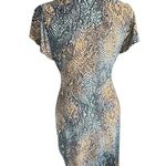 Nine West Snakeskin print fitted dress with a V-neckline and buckle details at the waist. Photo 1