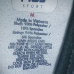 FILA  Performance M Sleeveless Running Fitted Top in White Black Trim Photo 5