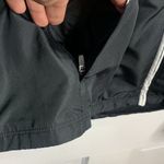 Under Armour  Women’s Crave Jacket Black with White Trim Windbreaker W-195 Size L Photo 2