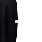 Vuori  Daily Split Flare Leggings Black Medium High-Waist Athleisure Workout Yoga Photo 6