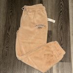 Women’s Cozy Faux Fur Sweatpants Tan Size XL Photo 1