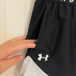 Under Armour EUC |  women’s active‎ heat gear loose fit black/white shorts — med. Photo 1