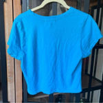 Talentless  baby tee short sleeve crop top bright aqua blue orange logo Photo 3